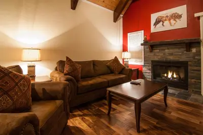 a living room with a couch and a fireplace at North Lake Lodges & Villas in Incline Village