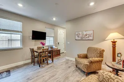a living room with a table and chairs and a dining room at 7 Mi to Folsom Lake Sacramento Area Apartment in Folsom