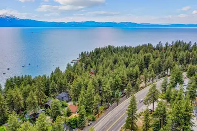 an aerial view of a road next to a lake at Zephyr Cove first level 1 Bed: close to everything bike, ski, swim! in Zephyr Cove