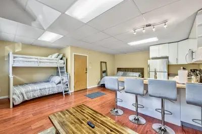 a living room with a bunk bed and a kitchen at First level studio suite close to everything bike, ski, swim Zephyr Cove! in Zephyr Cove