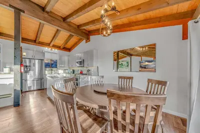 a kitchen and dining room with a table and chairs at Lake Tahoe Vacation Rental Fireplace and Balcony in Incline Village