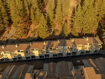 an aerial view of a resort with trees and buildings at Lake Tahoe Vacation Rental Fireplace and Balcony in Incline Village
