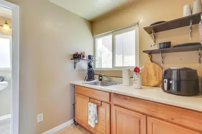 a kitchen with a sink and a window at Lake and Mountain Views Cozy California Stay in Mountain Mesa