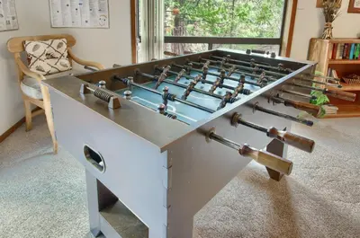 a large foosball table with a blue top at Pohono Pines in Wawona