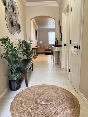 a hallway with a couch and a table and a rug at 30Min To SouthTahoe 3BD Parking in Carson City