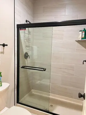 a shower with a glass door in a bathroom at 30Min To SouthTahoe 3BD Parking in Carson City