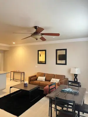 a living room with a couch and a table at 30Min To SouthTahoe 3BD Parking in Carson City