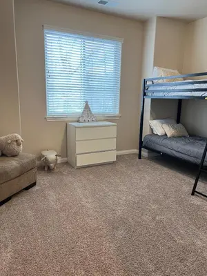 a bedroom with two bunk beds and a window at 30Min To SouthTahoe 3BD Parking in Carson City