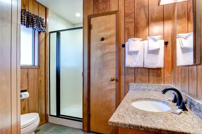 a bathroom with a sink and a toilet at Robin's Nest in Wawona