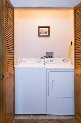 a white counter in a room with a sink at Big Pine Lodge in Wawona