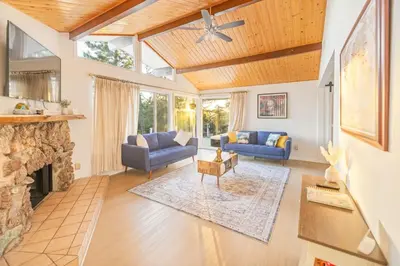 a living room with couches and a fireplace at Hillside Sky Ranch Retreat 12 miles from Yosemite in Oakhurst