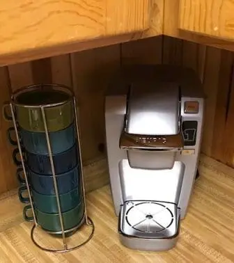 a coffee maker and printer sitting on a floor at Edna's Hearts Desire in Wawona