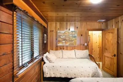 a small room with a bed and a window at Sugar Pine Suite in Wawona
