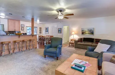 a living room with a couch and a table at Ashbaugh Meadow in Wawona