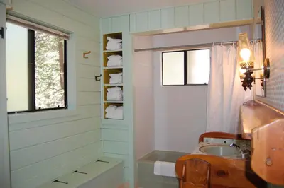 a bathroom with a sink and a window at Burke's Place in Wawona