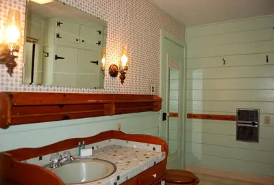 a bathroom with a sink and a mirror at Burke's Place in Wawona
