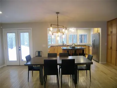 a dining room and kitchen with a table and chairs at 725 Lynda Court Incline Village Nevada USA in Incline Village