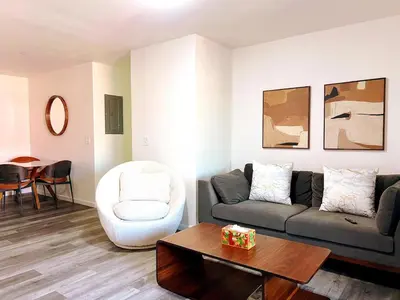 a living room with a couch and a table at Orchard Parks in Tracy