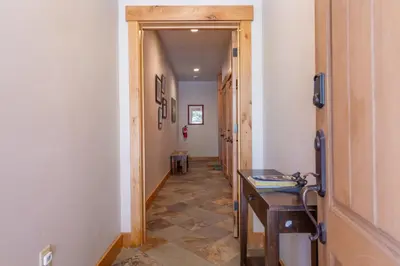a hallway with a desk and a hallway with at Deluxe Truckee Townhome 3BDR Dog Friendly Great Location in Truckee