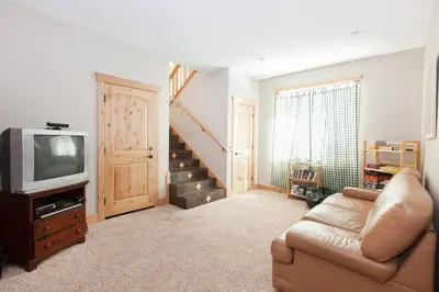 a living room with a couch and a tv at Luxury Home Near Lake, Heavenly, Casinos in South Lake Tahoe