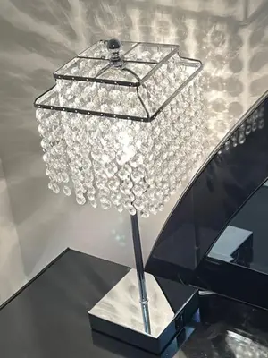 a large chandelier hanging from a ceiling at MidTown Art Deco in Reno