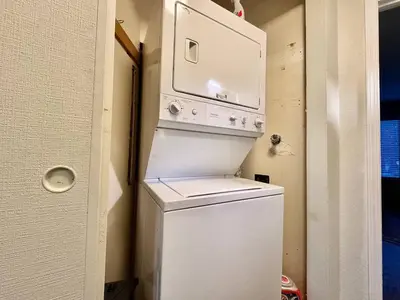 a white washer and dryer in a room at One The First Fairway - Walk to the Lake in Incline Village