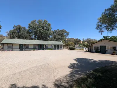 an empty driveway in front of a building at Squaw Valley Motel Room 4 in Squaw Valley