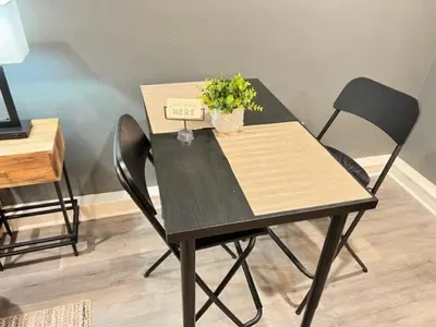 a black table with a plant in a box on it at Romantic Couples Retreat - Tahoe Room in Reno