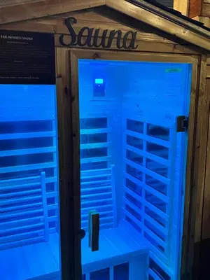 a sauna is lit up in blue at Romantic Couples Retreat - Tahoe Room in Reno