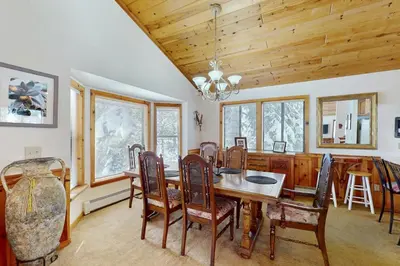 a dining room with a table and chairs at North Shore Escape in Carnelian Bay
