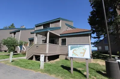 a house with a sign in front of it at LLC1236 - Lakeside Landing condo in South Lake Tahoe