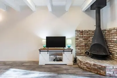 a living room with a tv and a fireplace at 3BR Condo Near Lake & Skiing in Incline Village