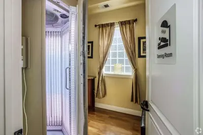 a hallway with a door leading to a window at New Elegant 1BR Retreat Heated Pool Gym & Sauna in Reno