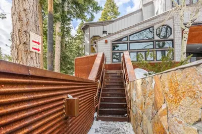 a set of stairs leading up to a house at Cedar and Snow in Mammoth Lakes