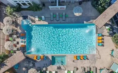an overhead view of a swimming pool at a resort at New Upscale 1BR Stay with Mini Golf Sauna & Heated Pool in Reno