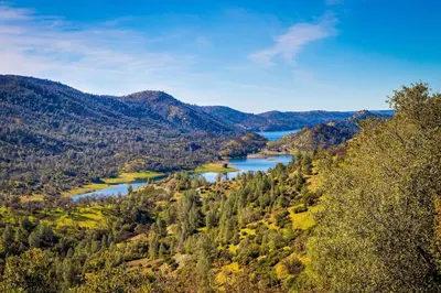 a view of a valley with a river and mountains at Restoration House in Groveland