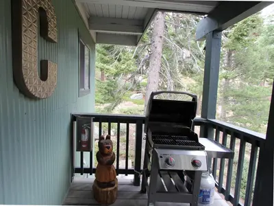 a grill on the front porch of a house at HNC0628 - Stagecoach Escape condo in Stateline