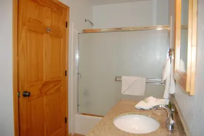 a bathroom with a sink and a shower at 9N Fox Hollow in Wawona