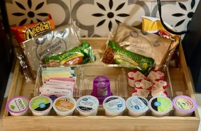 a wooden tray with some snacks and other food at The Rivet in Reno