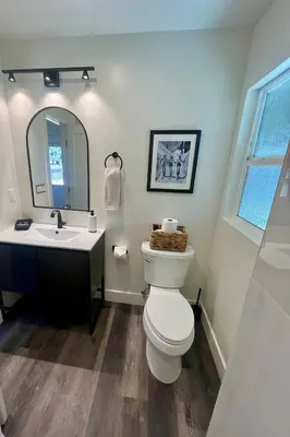 a bathroom with a white toilet and a sink at Emerald Bay Escape in South Lake Tahoe