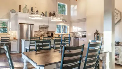 a dining room with a table and chairs at Views Mins to Skiing Lake Incline Village Incline Serenity by AvantStay in Incline Village