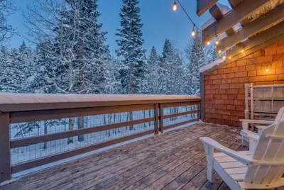 a deck with two chairs and a bench on it at Chinquapin Condo Retreat - Walk to the Lake in Tahoe City