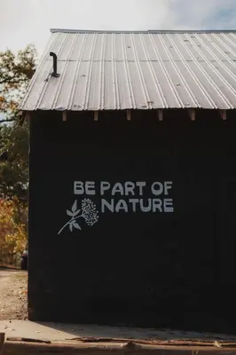 a building with the words be part of nature at Cosy yurt at a nature retreat in Sequoia N Forest in Miramonte