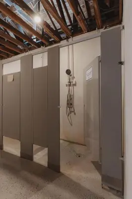 a row of doors in a room with a ceiling at Cosy yurt at a nature retreat in CA in Miramonte