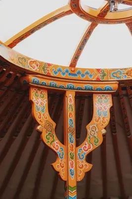 a wooden ceiling with colorful designs on it at Glamping yurt at Sequoia Highland Camp in Miramonte