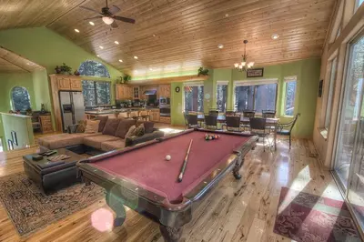 a living room with a pool table in it at COH1669 - Hawk's View Hideaway home in South Lake Tahoe