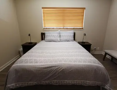 a bedroom with a large bed with a window at COH1261 - Nature's Gem home in South Lake Tahoe