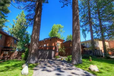 an exterior view of a house with trees at CYH1281- Tahoe Acres home in South Lake Tahoe