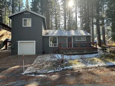a small house in the middle of a forest at COH0957 - Bella Ari home in South Lake Tahoe
