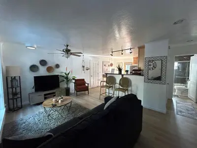 a living room with a couch and a table at COH0957 - Bella Ari home in South Lake Tahoe